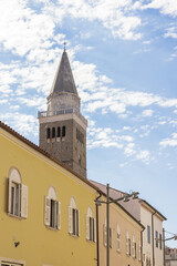 Fototapeta na wymiar The cathedral tower of Koper stanfing tall above the small town