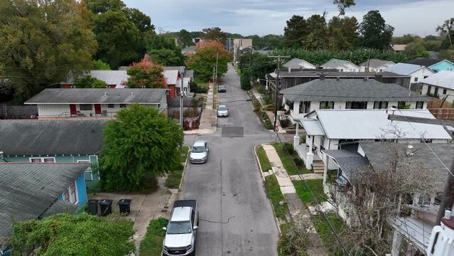 Homes in Southern USA. Aerial establishing shot of housing community on overcast day.