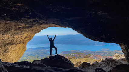 cave expedition in mountains and person enjoying life