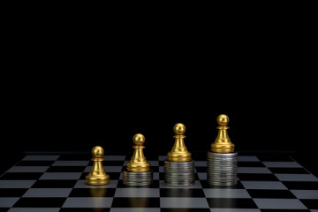 Chess with piles of coins on the board. Plan the use of money. Money game concept. Copy space.