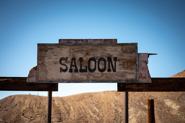 Wooden Saloon Sign in Old Wild West Ghost Town