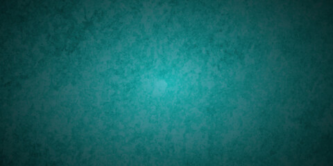 Background with light wall texture and background .  Blue green vintage background with aged grunge texture and soft color design .   