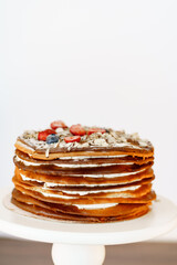 homemade cake with berries and cream. pancake pie.