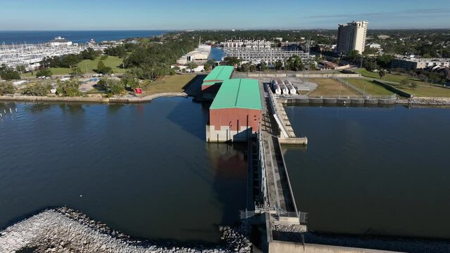 Flood pumping station and levee system to protect New Orleans from flooding. Lake Pontchartrain Louisiana. Aerial view.