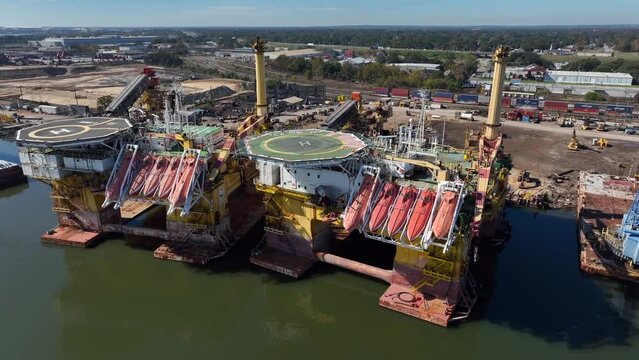 Oil and gas drilling rig at port in Mobile Alabama. Aerial view.