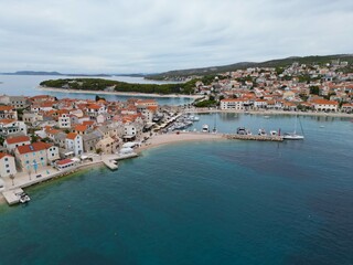 Fototapeta na wymiar Primosten town and harbour Croatia drone aerial view