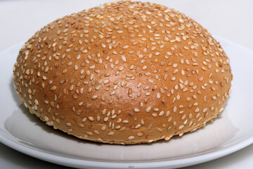 White sweet bun with sesame seeds