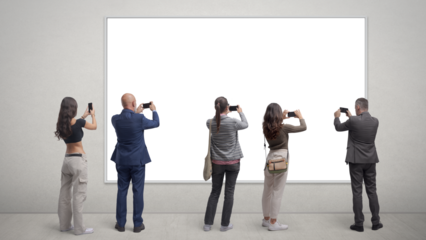 People taking pictures of a painting