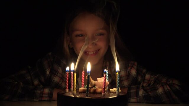 Kid Birthday Party Blowing Candles in Night, Child Portrait Celebration, Young Teenager Girl Anniversary in Dark Evening