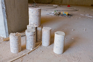 Concrete sample drilled for quality inspection - obrazy, fototapety, plakaty