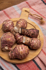 Group of fresh uncooked topinambur or Jerusalem artichoke roots