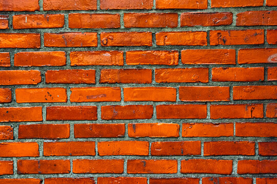 Vibrant orange brick wall detail texture asset with dark grey mortar