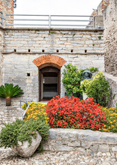 Fototapeta na wymiar Architecture in the fortress in the old town of Malcesine Garda Lake, Italy