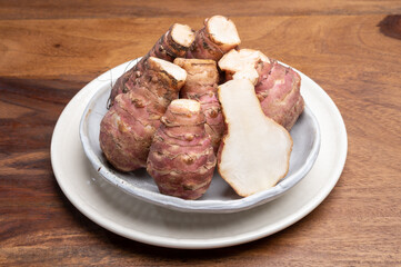Group of fresh uncooked topinambur or Jerusalem artichoke roots