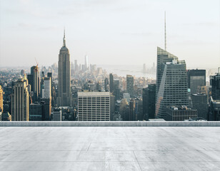 Empty concrete dirty rooftop on the background of a beautiful NY city skyline at daytime, mock up