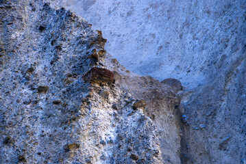 Close-up of cliff at canyon of Anterior Rhine Valley on a blue cloudy autumn morning at Versam, Canton Graubünden. Photo taken September 26th, 2022, Versam, Anterior Rhein valley, Switzerland.