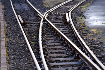 Close-up of railway switch of narrow gauge railway at train station Versam- Safien, Canton Graubünden, on a sunny autumn day. Photo taken September 26th, 2022, Versam, Switzerland.