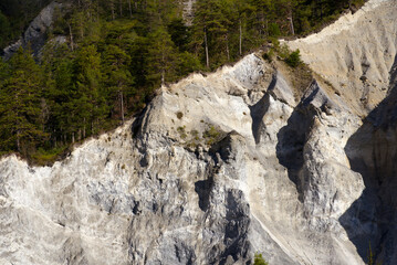 Fototapeta na wymiar Beautiful rock formation at gorge of Anterior Rhine Valley at Versam, Canton Graubünden, on a sunny autumn day. Photo taken September 26th, 2022, Versam, Switzerland.