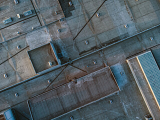 Top down view of flat roof of industrial building.