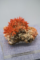 Closeup of naturally occurring rare red crystalline ore