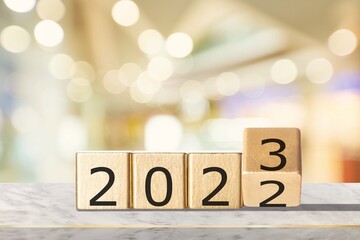 Wooden cube blocks set for 2023 new year concept