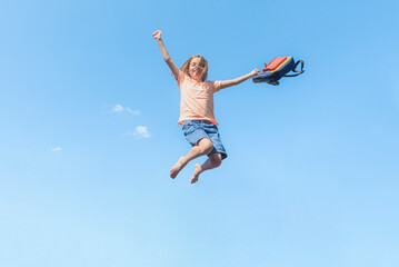 Banner with Girl  in a jump against the blue sky with a school bag. Happy summer.