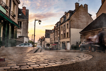 Central street in Blois, France. Beautiful city with mist, - Powered by Adobe