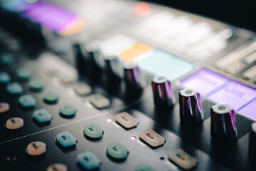 Sound control music mixer in record studio. Close up mixer and equalizer volume on the mixer...