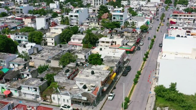 aerial skyline of residential buildings in Playa Del Carmen town on sunny day