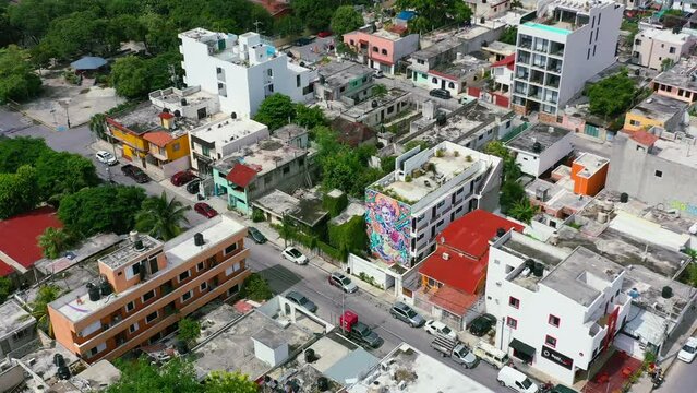 aerial cityscape of residential buildings in Playa Del Carmen Mexico on sunny day, top down view