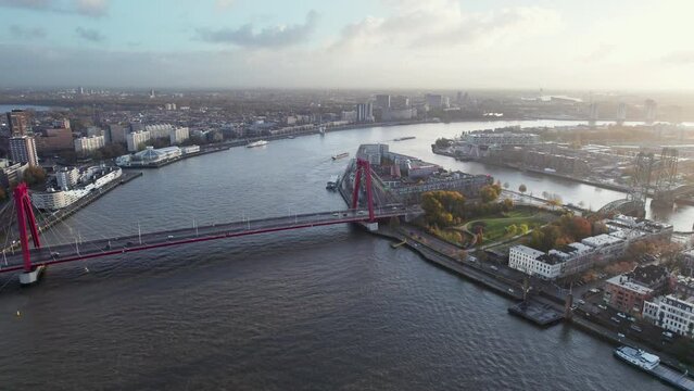 Williams Bridge (Wiilemsbrug) In The Centre Of Rotterdam Spanning Nieuwe Maas River At Dusk In The Netherlands. aerial