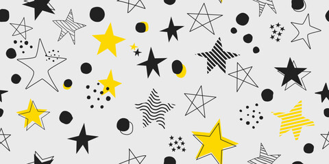 Black and yellow stars. Simple hand drawn stars. Vector decor and print, stylish design of seamless surfaces.
