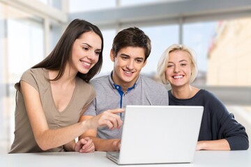 Young teacher helps students at university