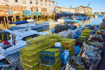 Fototapeta na wymiar Crates for fishing lobsters in piles at Portland Maine port