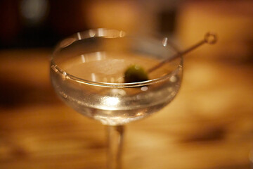 Martini Glass with Green Olives