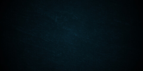 Dark black and blue stone concrete grunge wall texture and backdrop background anthracite panorama. Panorama dark black or blue slate background or texture.