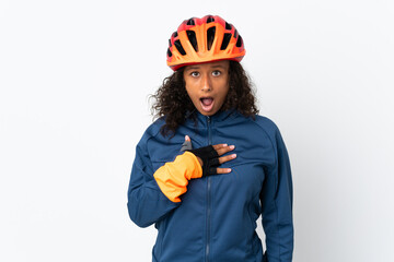 Teenager cyclist woman isolated on white background surprised and shocked while looking right - obrazy, fototapety, plakaty
