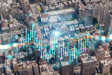 Obraz premium Skyscrapers Cityscape Downtown View, New York Skyline Buildings. Beautiful Real Estate. Day time. Forex Financial graph and chart hologram. Business education concept.