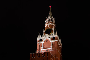 Spasskaya Tower of Moscow Kremlin at Red Square against background of the night sky in Moscow....