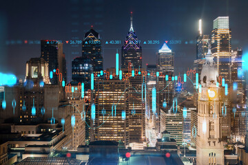 Aerial panoramic cityscape of Philadelphia financial downtown at summer night time, Pennsylvania, USA. Glowing forex candlesticks and bar graph hologram. The concept of internet trading and brokerage