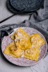 asian ravioli with chopsticks on plate