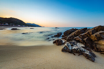 Northern side of Jeongdongjin Beach at sunset, Gangneung, Gangwon-do,South Korea. Long exposure.