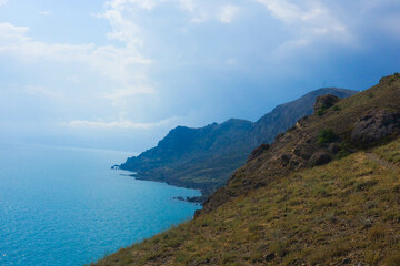 Fototapeta na wymiar Coast of the black sea in the Crimea in summer. Mountions.