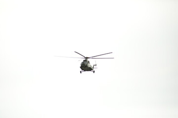 Helicopter flyung on the sky