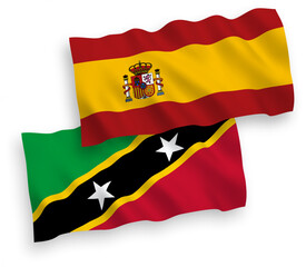 Flags of Federation of Saint Christopher and Nevis and Spain on a white background