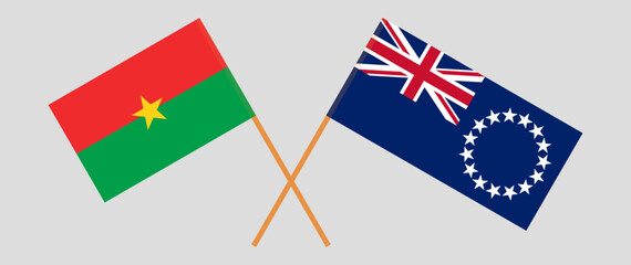 Crossed flags of Burkina Faso and Cook Islands. Official colors. Correct proportion