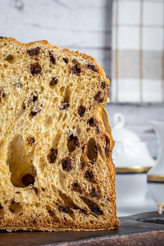 Half panettone on wooden table