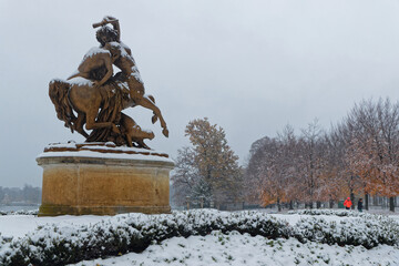 LYON, FRANCE, December 13, 2022 : City wakes up under a thin layer of snow, here in Parc de la Tete d'Or, the main city park of Lyon.