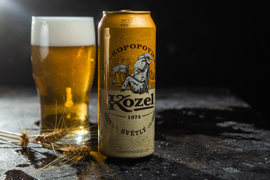 Light Beer Velkopopovicky Kozel in a jar on a dark background.