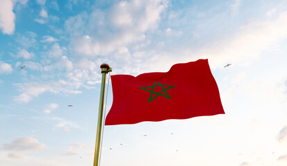 Flag of Morocco waving in the wind, sky and sun background. Morocco Flag. Ultra Hd, 3d rendering.